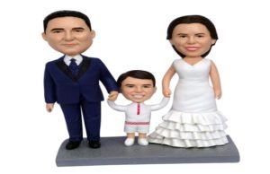 Go for cheap custom bobbleheads cake toper